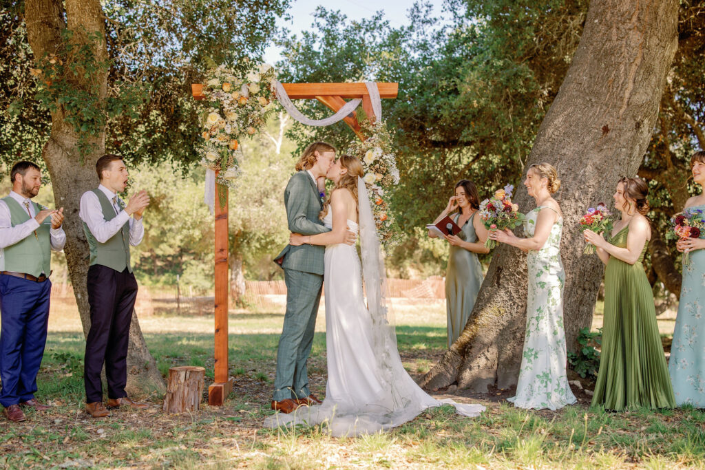 wedding ceremony under oak trees
